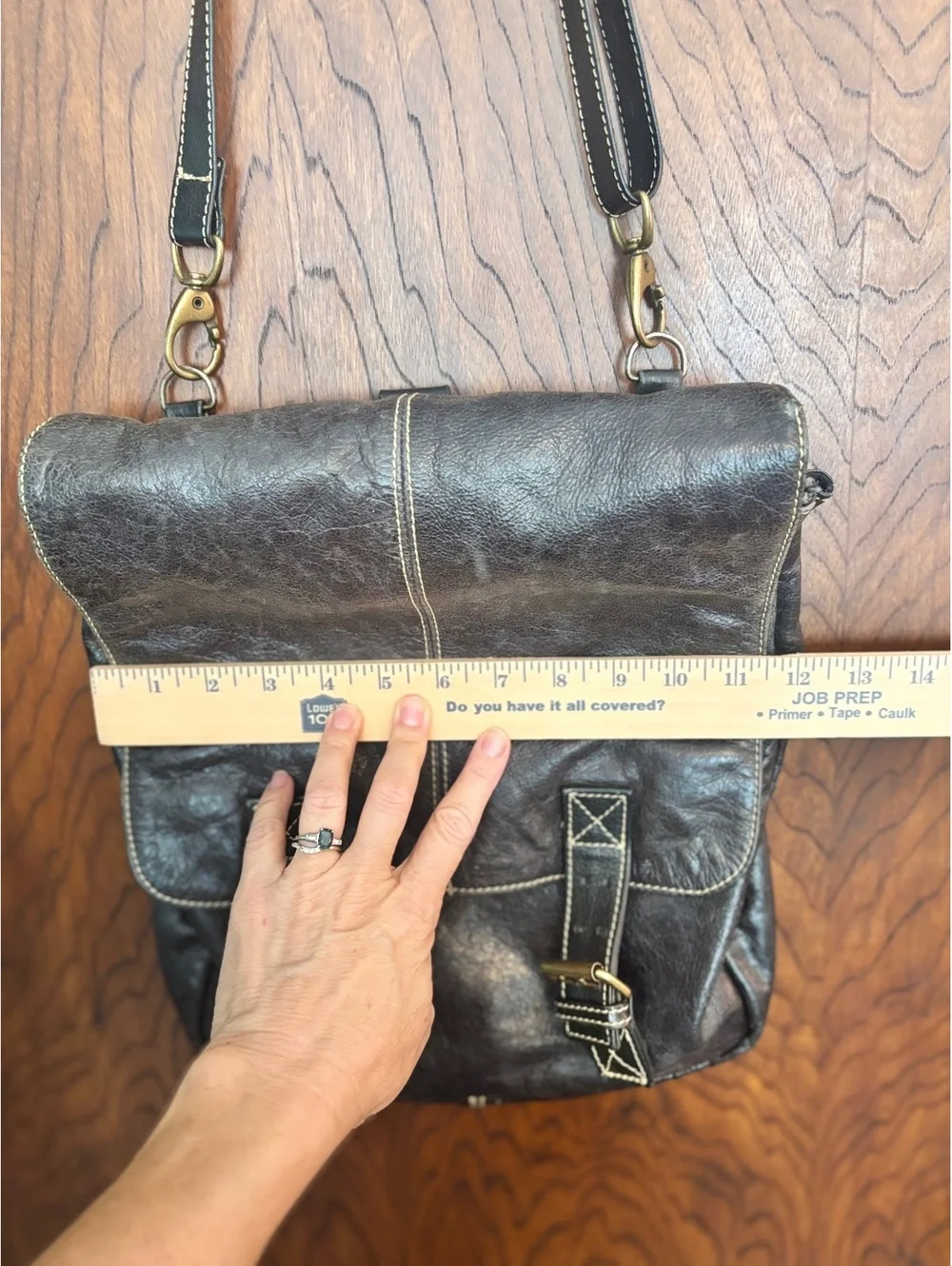 Black Leather Crossbody Backpack with Buckle Closure